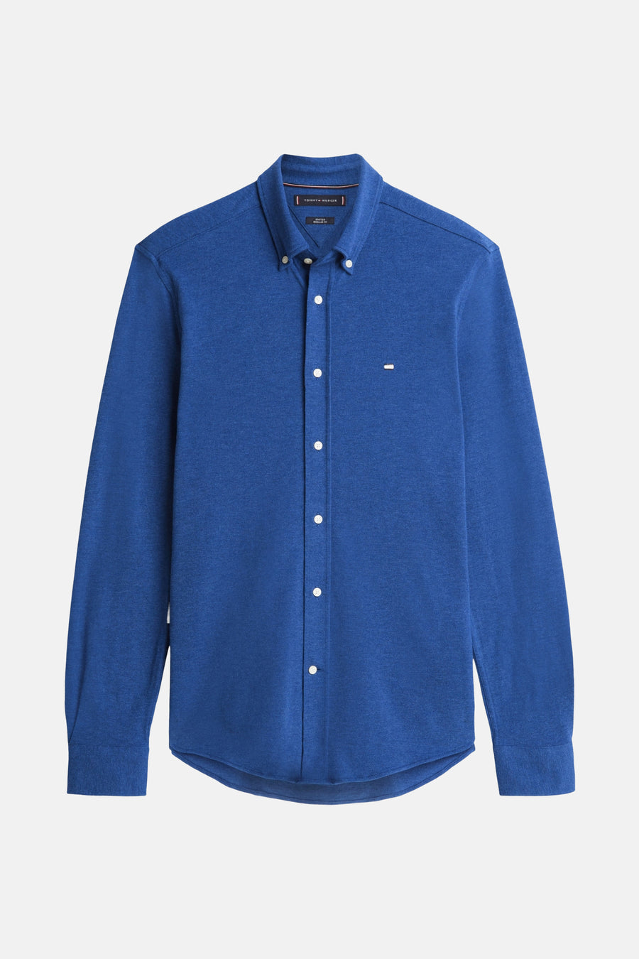Chemise à manches longues bleue de TOMMY HILFIGER, avec des boutons blancs et un logo subtil sur la poitrine.