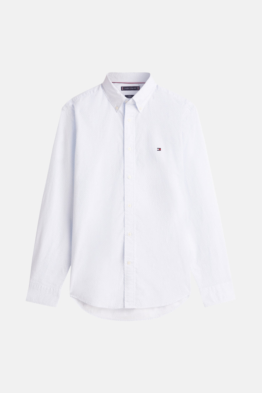 Chemise à manches longues bleue de TOMMY HILFIGER, avec un subtil motif texturé et le logo brodé sur la poitrine.