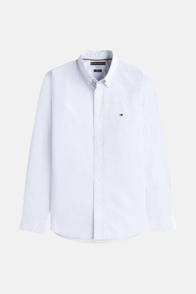 Chemise à manches longues bleue de TOMMY HILFIGER, à motif texturé subtil, coupe classique avec logo brodé.