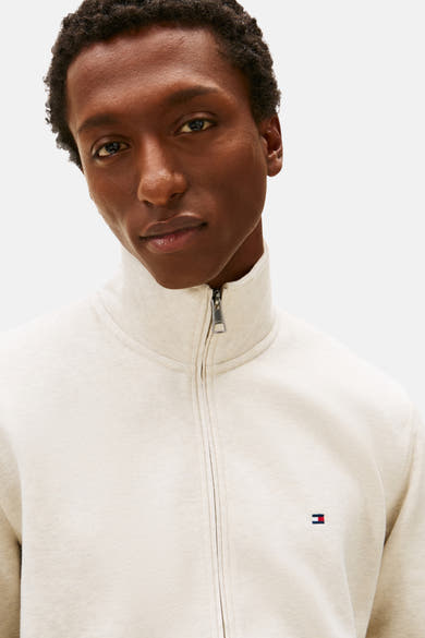 Gilet écru de TOMMY HILFIGER avec fermeture éclair et logo drapeau.