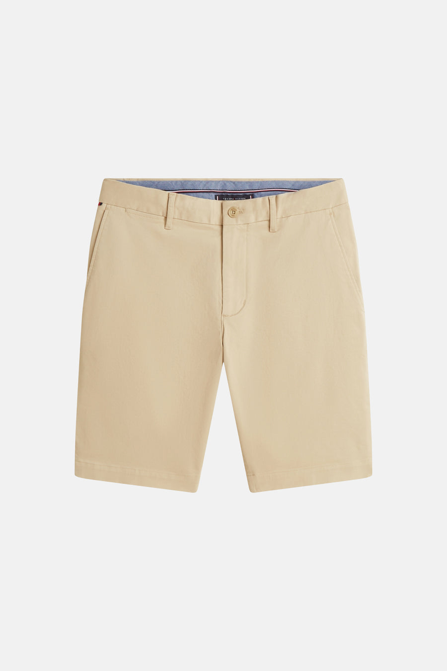 Bermuda beige de TOMMY HILFIGER, avec poches latérales et fermeture à bouton.