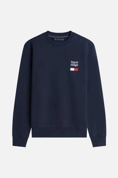 Sweat bleu encolure ras-de-cou de Tommy Hilfiger, avec logo brodé sur la poitrine.