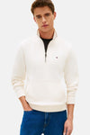 Sweat col montant écru de TOMMY HILFIGER avec poche kangourou et fermeture éclair.