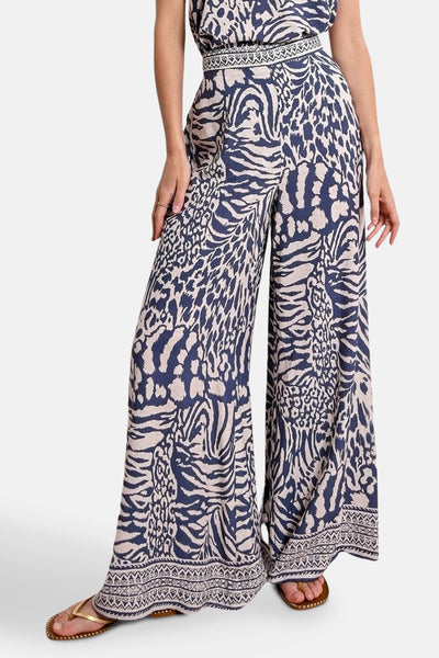 Molly Bracken blauwe wijde broek met dierenprint, met hoge taille en sierrand.