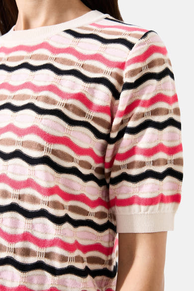 Pull à col rond multicolore de GARCIA, motif ondulé rose, noir et marron.