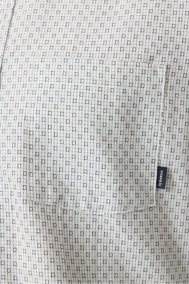Chemise à manches longues multicolore de GARCIA, motif à carreaux discrets, poche poitrine apparente.