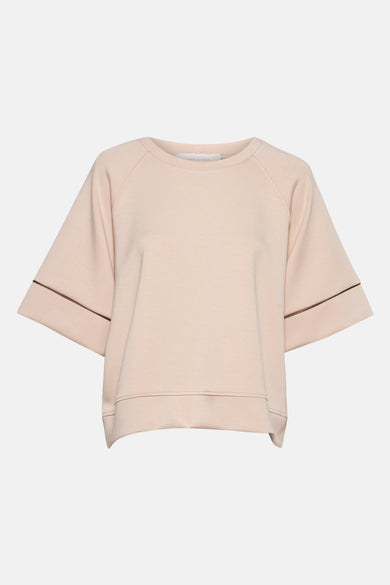Sweat beige à manches courtes d'AMÉLIE ET AMÉLIE, avec finitions contrastées aux manches.