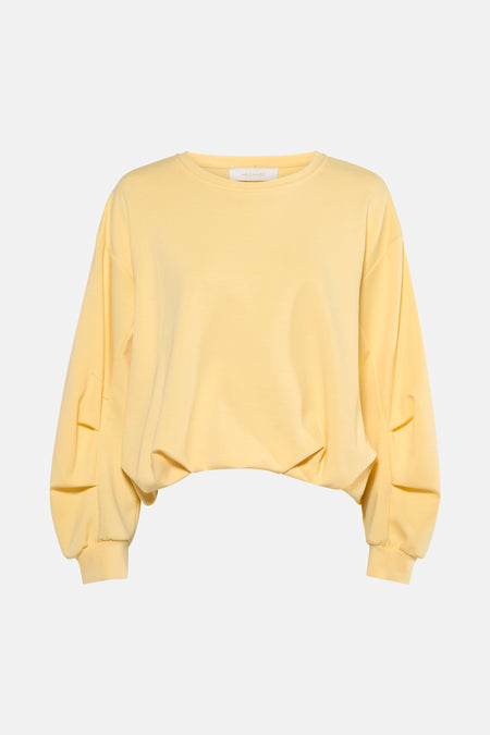 Sweat jaune col rond de AMELIE ET AMELIE, manches bouffantes avec plis décoratifs.
