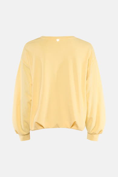 Sweat-shirt jaune col rond de AMELIE ET AMELIE, avec un petit motif de coeur sur le dos.