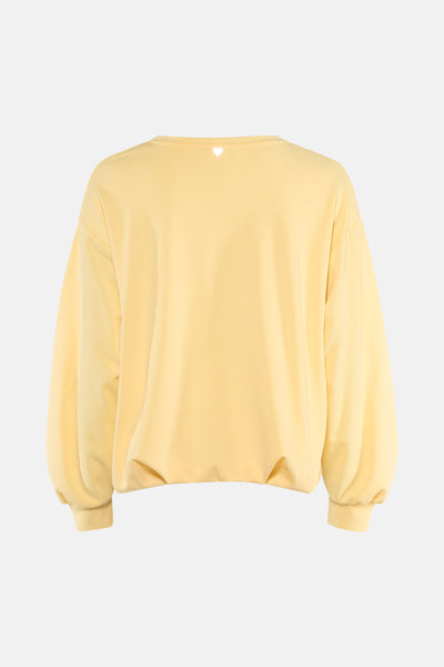 Gele ronde hals sweatshirt van AMELIE ET AMELIE, met een klein hartmotief op de rug.
