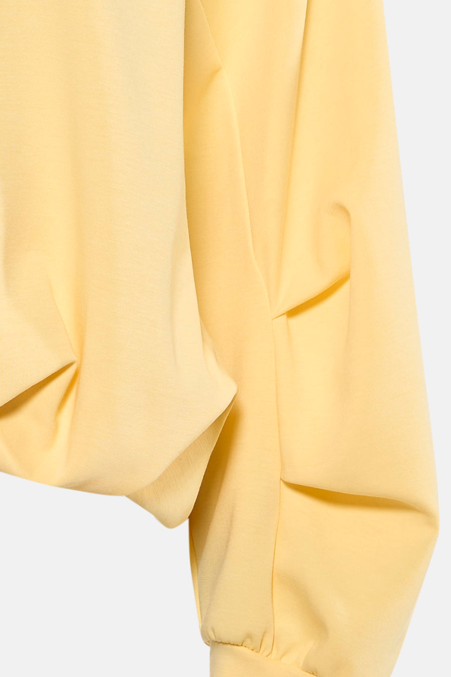 Sweat col O jaune de AMELIE ET AMELIE, avec manches bouffantes et poignets ajustés.