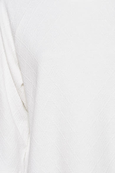 Zabaione wit rond T-shirt met subtiele geometrische textuur.