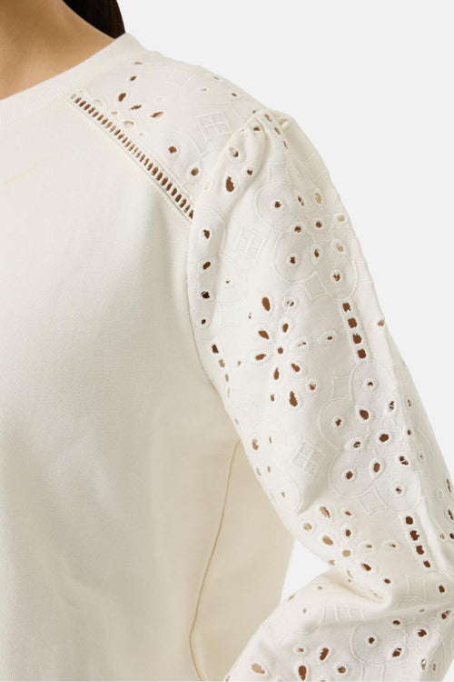 Sweat blanc col rond de GARCIA avec manches longues brodées à motifs floraux et géométriques.