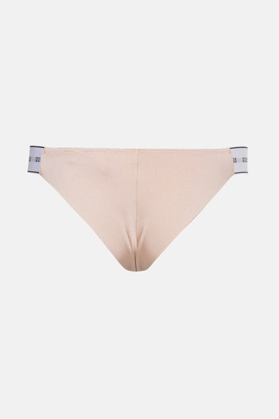 Beige slip van Guess met een elastische tailleband met logo.