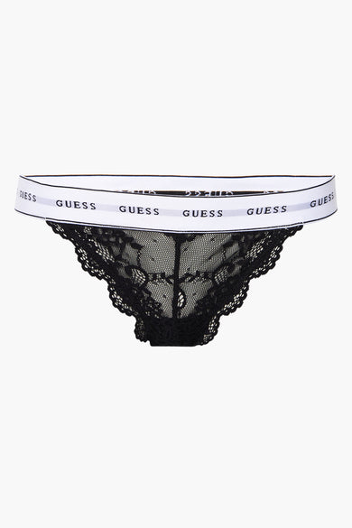 Slip noir en dentelle de Guess, avec une ceinture élastiquée blanche logotypée.
