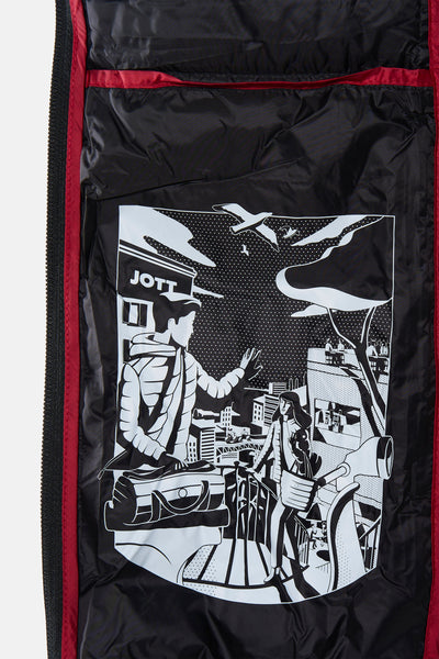 Veste courte noire de JOTT, avec motif imprimé original noir et blanc sur la doublure intérieure.