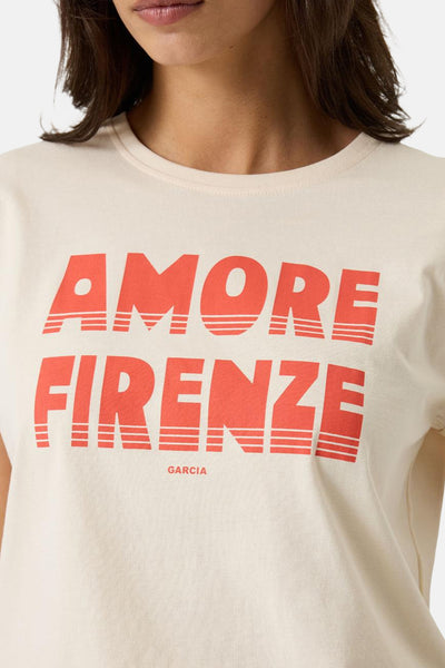 Ecru short-sleeve t-shirt by Garcia with bold coral "AMORE FIRENZE" graphic and striped letter detail, front view