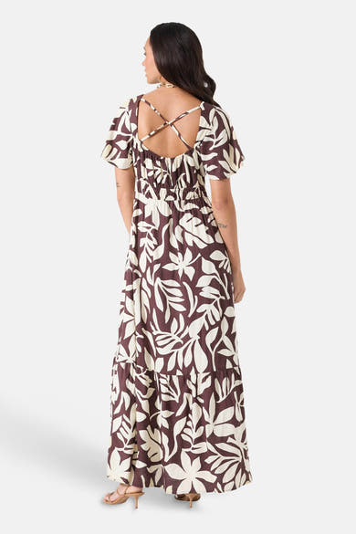 Robe longue multicolore de GARCIA, imprimé floral beige et marron, dos croisé et détail élastique à la taille.