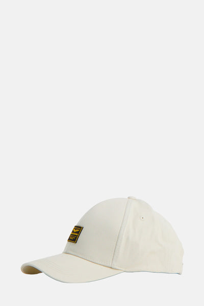 Ecru pet met rechthoekige logopatch aan de voorkant van PME Legend.