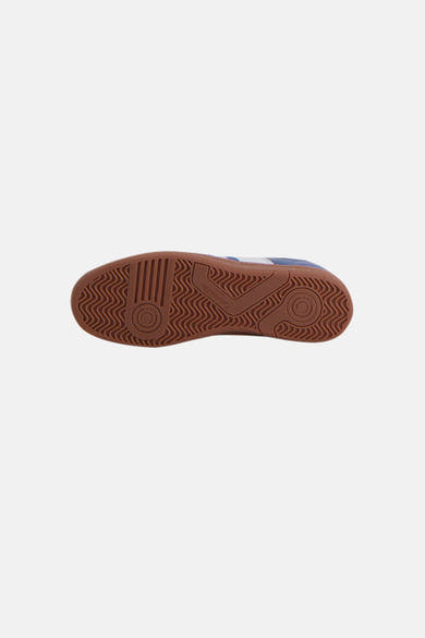 Blauwe sneakers van Pantofola d'Oro, met bruine textuurzool met visgraatpatroon.