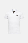 Polo blanc de Pme Legend, avec boutons noirs et écusson logo sur la poitrine.