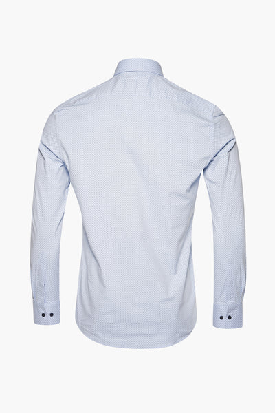 Chemise à manches longues bleue de PRIVATE BLUE, motif à pois, boutons aux poignets, vue de dos.
