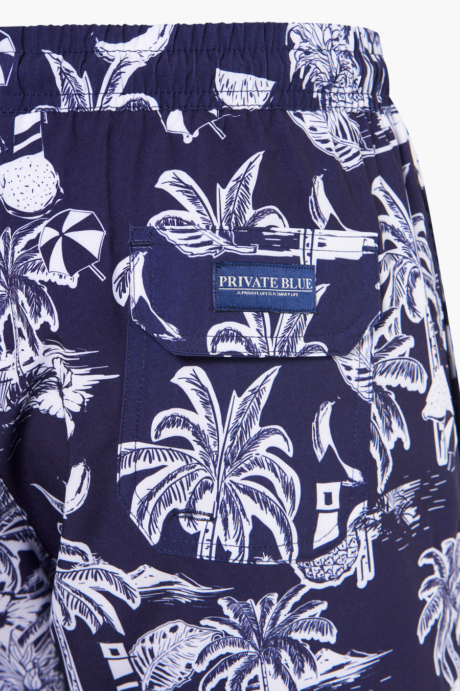 Blauwe zwembroek met tropische print van PRIVATE BLUE, met achterzak en elastisch trekkoord.