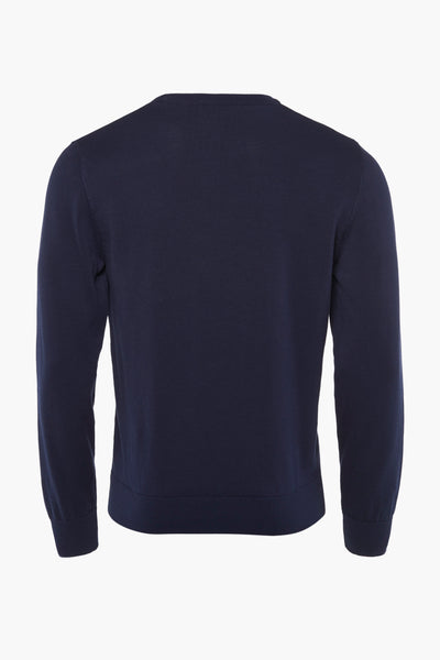 Navy blue crewneck sweater back view, ribbed cuffs and hem, smooth knit texture