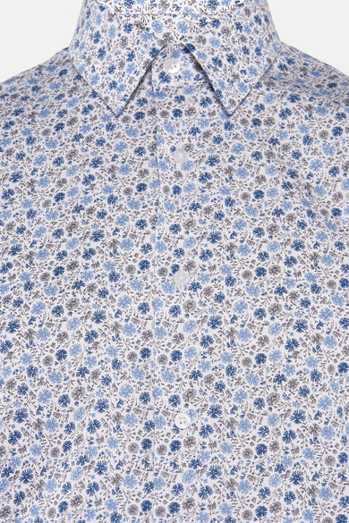 Chemise à manches longues bleue de PRIVATE BLUE, imprimé floral sur l'ensemble, boutonnée.