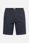 Short bleu de PRIVATE BLUE, coupe chino, avec fermeture boutonnée et poches latérales.