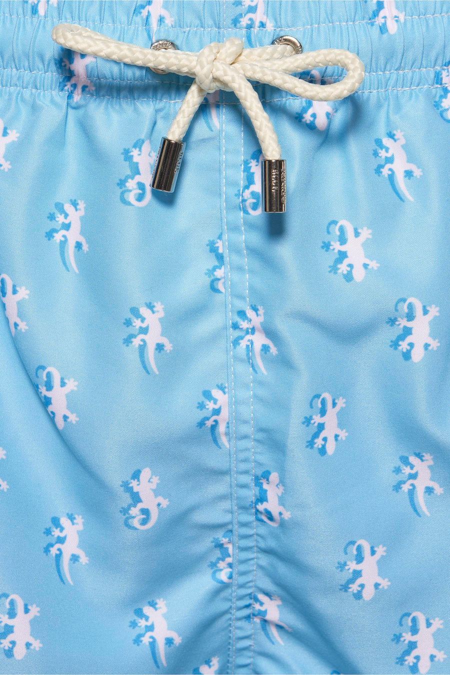 Turquoise zwembroek van PRIVATE BLUE, wit hagedispatroon, trekkoord in de taille.