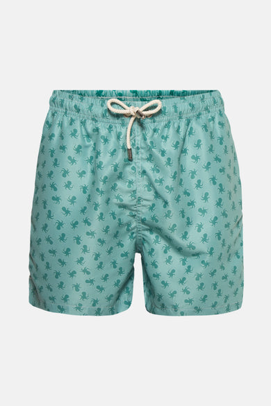 Short de bain vert de PRIVATE BLUE, à motif pieuvres turquoise, avec cordon de serrage blanc.
