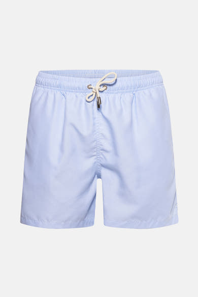 Lichtblauwe zwembroek van PRIVATE BLUE, met paspelzak aan de achterkant en elastische tailleband.