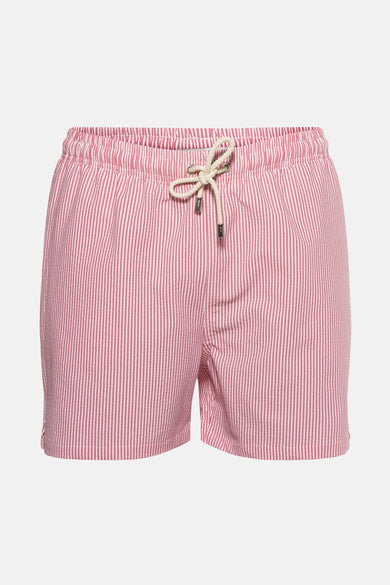 Short de bain rose en tissu texturé de Private Blue, avec rayures verticales et cordon de serrage.