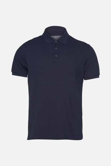 Polo à manches courtes bleu foncé de Private Blue, avec col et patte de boutonnage.