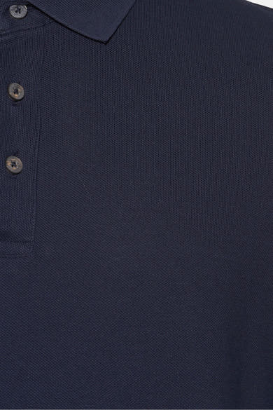 Donkerblauw poloshirt met korte mouwen van PRIVATE BLUE, met een pique textuur en ton-sur-ton knopen.
