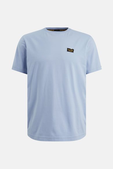 T-shirt bleu à manches courtes de PME Legend, avec un petit logo carré sur la poitrine.