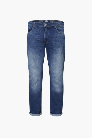 Jean tapered bleu moyen de Petrol Industries, délavage sur le devant et ourlets retournés.