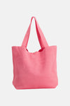 Sac à bandoulière rose de Access® en maille ajourée avec un bouton-pression doré.