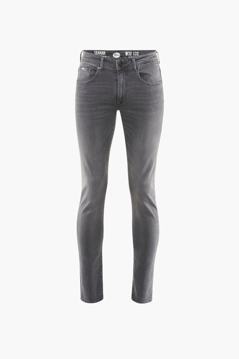 Jean slim gris foncé de Petrol Industries®, avec une coupe fuselée et une texture subtile.