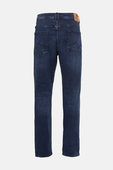 Jeans slim bleu foncé de Petrol Industries®, avec poches arrière et étiquette en cuir.