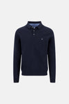 Polo à manches longues bleu de FYNCH-HATTON, avec patte de boutonnage et logo brodé discret.
