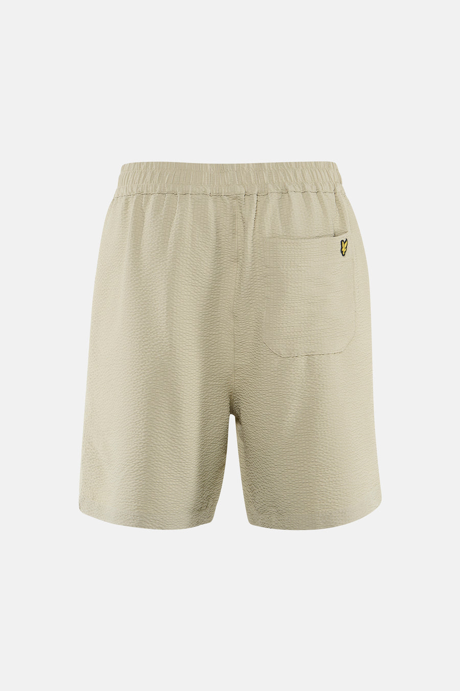 Korte beige short van LYLE & SCOTT, getextureerde achterkant met elastische tailleband en klein geel vogellogo.