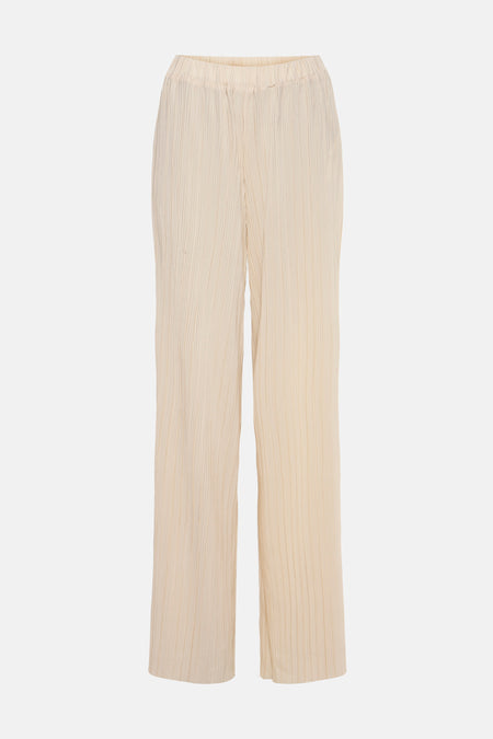 Beige geplooide broek van Zabaione, met een elastische tailleband en een gekreukte textuur.