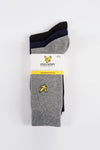 Grijze sokken van LYLE & SCOTT, met geborduurde gele adelaarslogo's, gebreide textuur.