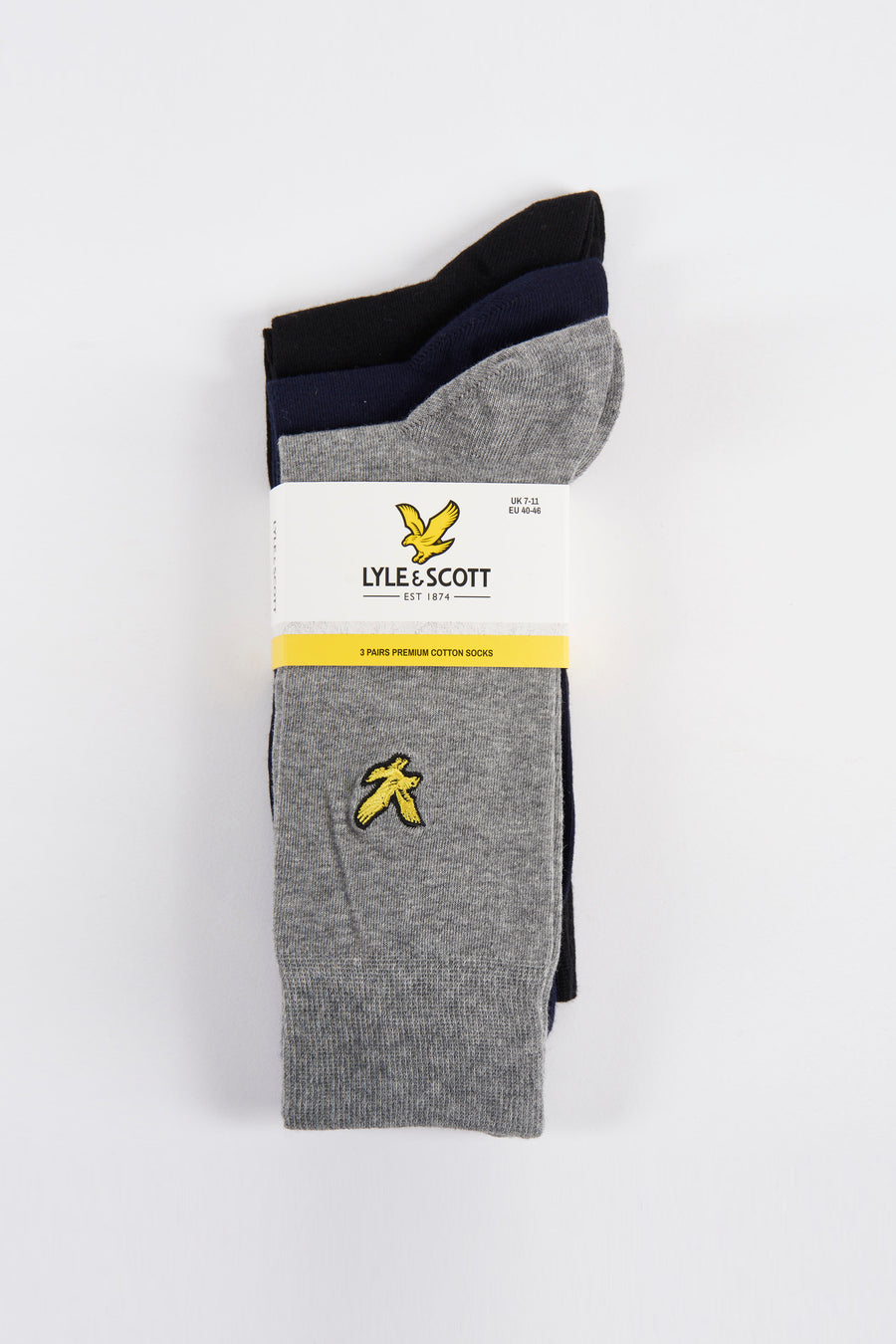 Grijze sokken van LYLE & SCOTT, met geborduurde gele adelaarslogo's, gebreide textuur.