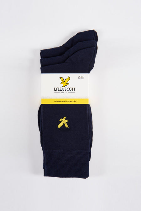 Blauwe sokken van LYLE & SCOTT, met geborduurd geel adelaarslogo aan de zijkant.