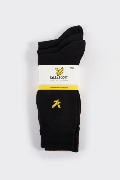 Zwarte sokken van LYLE & SCOTT, met een geborduurd geel vogel-logo aan de zijkant.