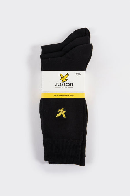 Zwarte sokken van LYLE & SCOTT, met een geborduurd geel vogel-logo aan de zijkant.