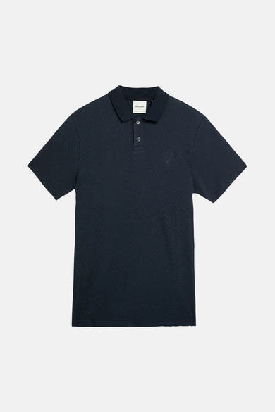 Blauwe polo met korte mouwen van LYLE & SCOTT, met een subtiel textuurpatroon.